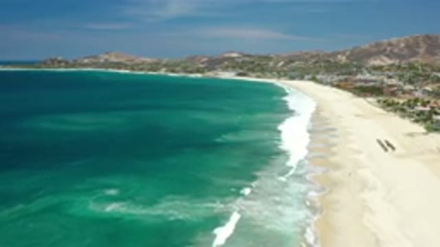 LOS CABOS MEXICO-2020: The Long View Of The Beach Near Mountain And Blue Sky