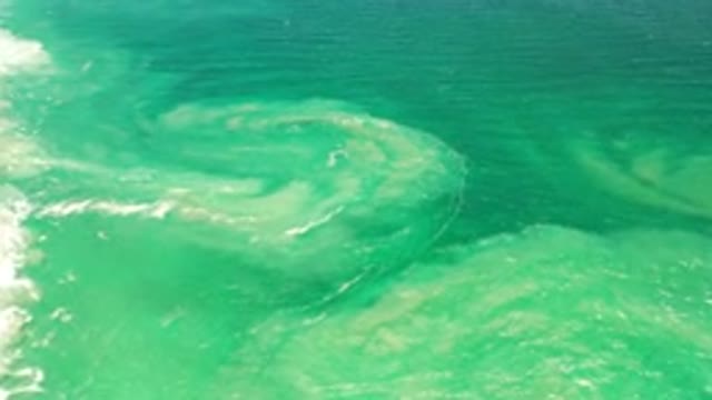 LOS CABOS MEXICO-2020: Aquamarine Water Swirls Offshore Mixed With Surf And