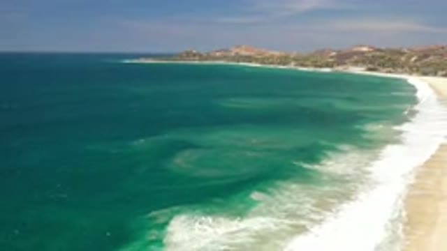 LOS CABOS MEXICO-2020: The Long View Of The Mountain Near Blue Beach And Sky
