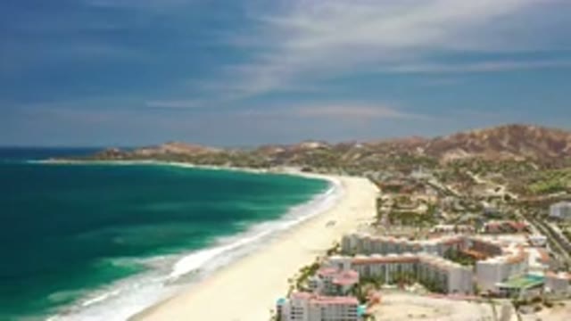 LOS CABOS MEXICO-2020: Overlooking A Resort On The Beach With Extremely Blue Waters