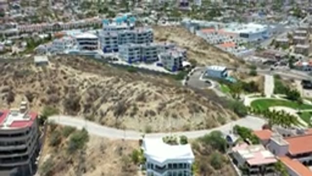 LOS CABOS MEXICO-2020: Beautiful Building Along A Sunny Hillside Landscape