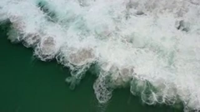 LOS CABOS MEXICO-2020: Rolling Waves On The Ocean Near A Shoreline