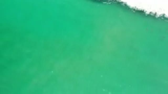 LOS CABOS MEXICO-2020: Aerial Footage Of A Camera Looking Down At Greenish Blue Water