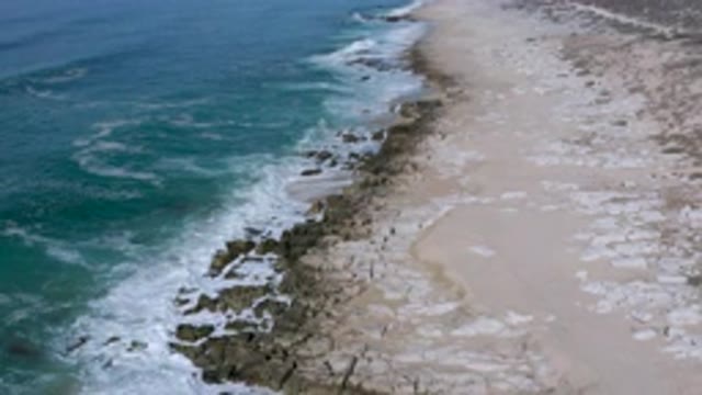 LOS CABOS MEXICO-2020: Waves That Break On The Edge Of The Beach Waiting For