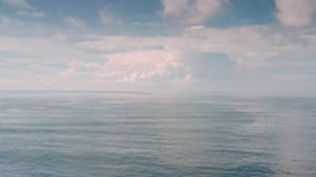 LOS CABOS MEXICO-2020: Water Top View With Clouds In The Sky