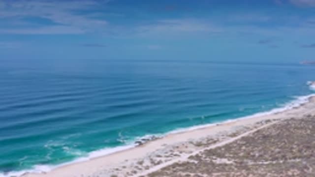 LOS CABOS MEXICO-2020: Breathtaking View On A Sunny Day At The Beach With Waves And Sand