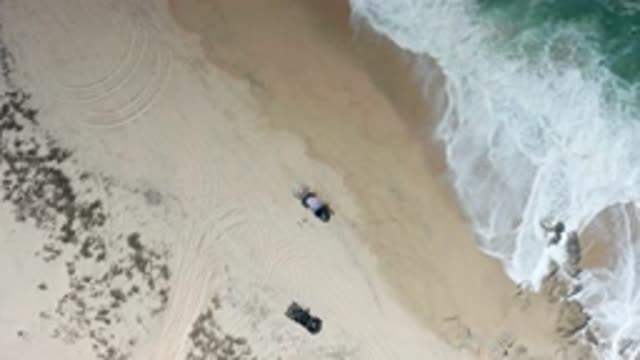 LOS CABOS MEXICO-2020: Aerial Footage Of A Sunny Beach With Crashing Waves While