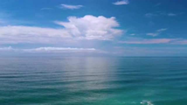 LOS CABOS MEXICO-2020: A Beautiful Sky Overlooks A Serene Ocean Surface