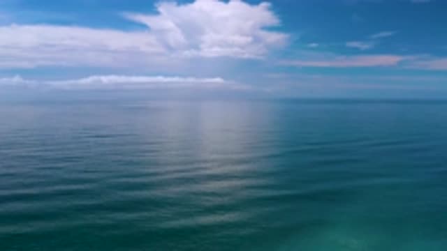 LOS CABOS MEXICO-2020: Long View Of Blue Water Sea With White And Blue Clouds