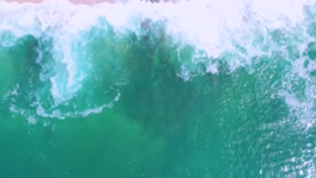 LOS CABOS MEXICO-2020: Aerial View Of The Ocean Waves Cascading Into The Shore