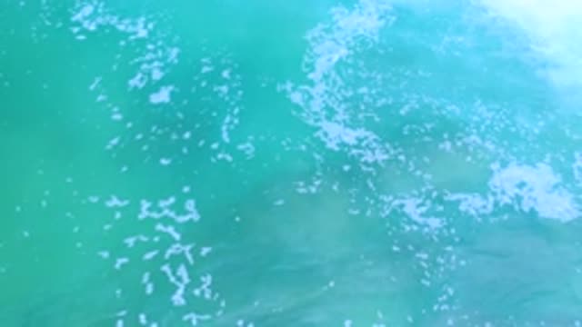LOS CABOS MEXICO-2020: Peaceful Tropical Blue Waves Rolling With White Bubbles