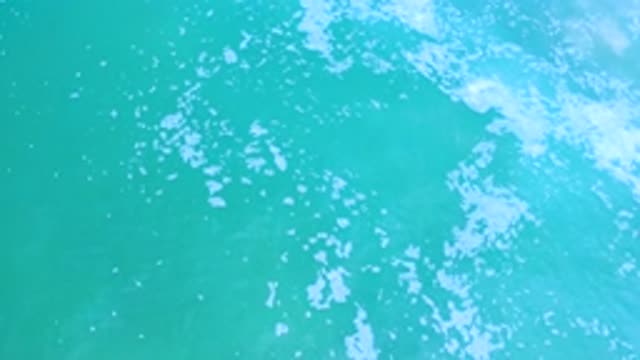 LOS CABOS MEXICO-2020: Medium Turquoise Sea Water With Wave Foam