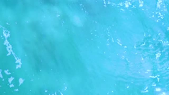 LOS CABOS MEXICO-2020: Aerial Footage Of A Large Body Of Water With Light Blue