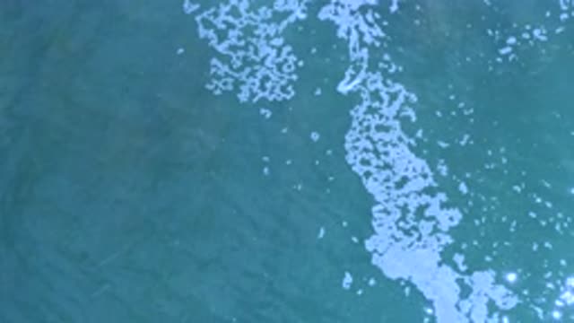 LOS CABOS MEXICO-2020: Aerial View Of Air Bubbles In A Deep Clear Ocean