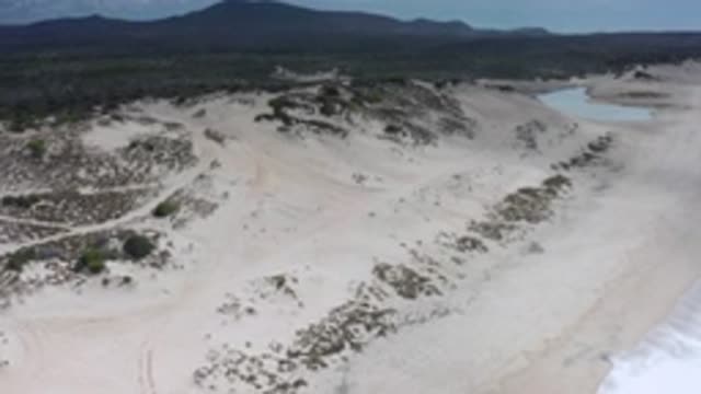 LOS CABOS MEXICO-2020: Hills In The Background With Beautiful Sea Beach With Waves