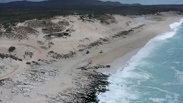 LOS CABOS MEXICO-2020: Upper View Shows Blue Sea Waves Touches The Beach Which