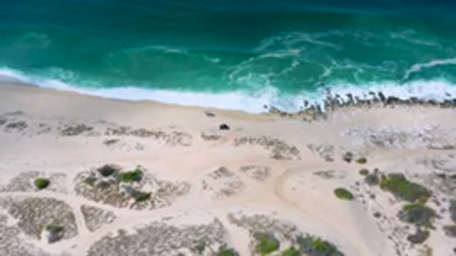 LOS CABOS MEXICO-2020: Top View Of The Beach With Dark Sand