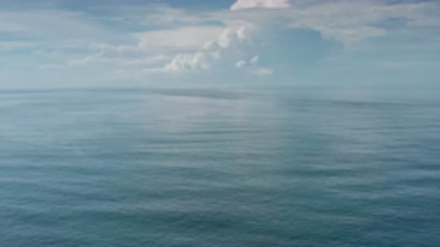 LOS CABOS MEXICO-2020: Flying Over Infinite Waters Under A Sky With Clouds That