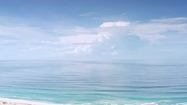 LOS CABOS MEXICO-2020: Clouds Reflecting On Blue Water Near The Coast