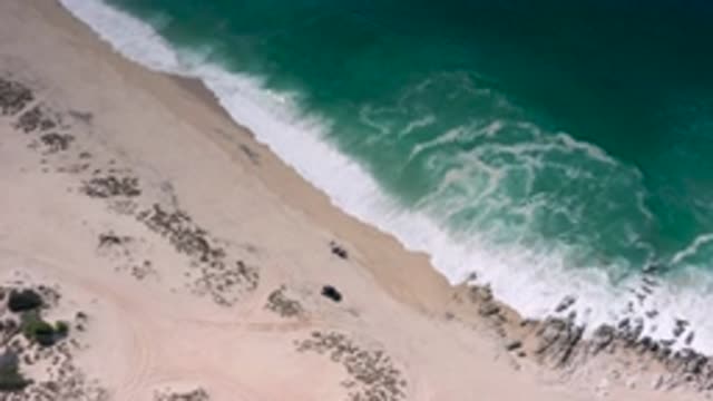 LOS CABOS MEXICO-2020: Blue Clear Water Hitting The Sand And Providing A
