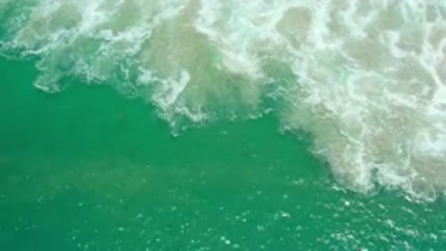 LOS CABOS MEXICO-2020: Calm Green Fresh Water Waves Meet Salt Water