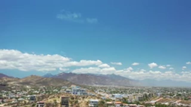 LOS CABOS MEXICO-2020: Hot Desert City Surrounded By Mountains In The Background