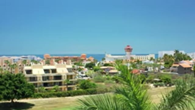 LOS CABOS MEXICO-2020: Multi-Storied Buildings With Landscaped Lawns And Trees