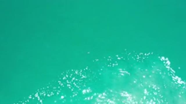 LOS CABOS MEXICO-2020: Flowing Semi-Cloudy Ocean Water With Glimmers Of Daylight