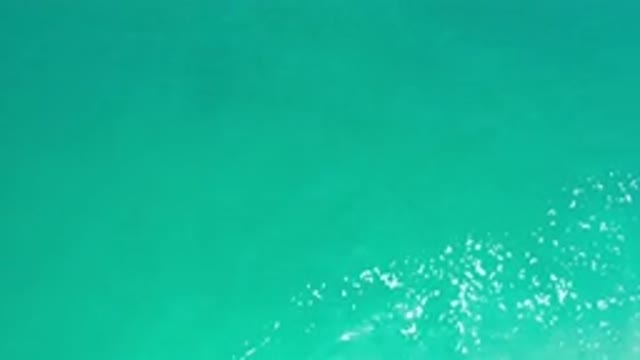 LOS CABOS MEXICO-2020: The Top View Of The Silent Blue Sea With White Bubbles