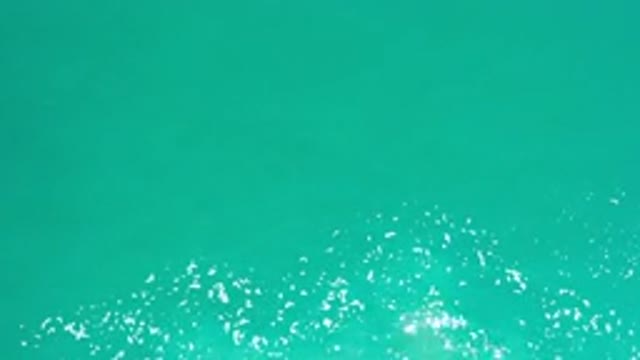 LOS CABOS MEXICO-2020: A Clear Turquoise Ocean With A Little Bit Of Foam And The