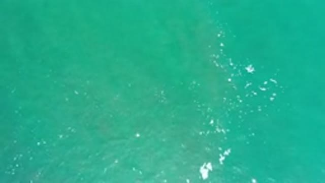 LOS CABOS MEXICO-2020: Ocean Waves With A Light Breeze And The Sun's Glare On