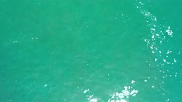 LOS CABOS MEXICO-2020: A Wide Sky View Of Calm And Green Ocean Waves