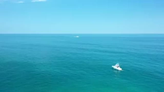 LOS CABOS MEXICO-2020: Small Fishing Boat Compared To The Vast Open Waters