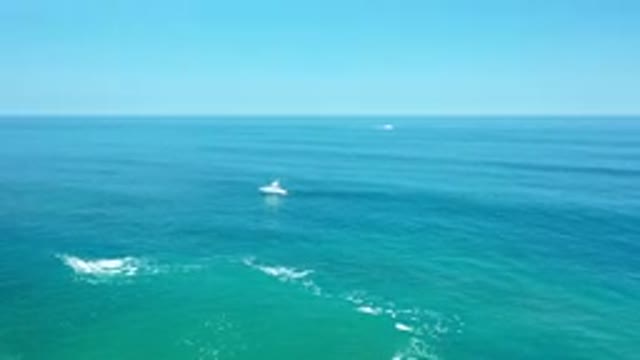 LOS CABOS MEXICO-2020: A Ship On A Calm Blue Ocean During A Sunny Day
