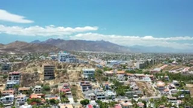 LOS CABOS MEXICO-2020: Drone Shot Over Desert City Showing Nice Houses And Mountains