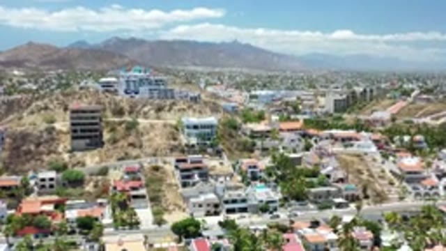 LOS CABOS MEXICO-2020: Beautiful Drone Shot Of A Desert Vacation City With A