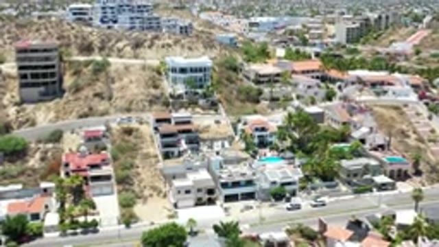 LOS CABOS MEXICO-2020: Bird's Eye View Of Tall Clean Buildings Sitting Along The Hillside