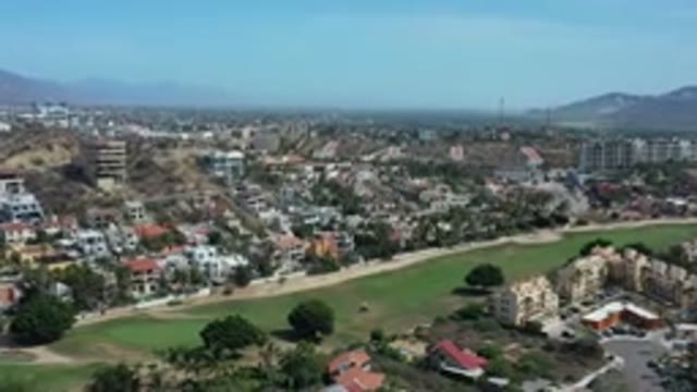 LOS CABOS MEXICO-2020: Sky View Of Houses Zooming In On Beautiful Grass