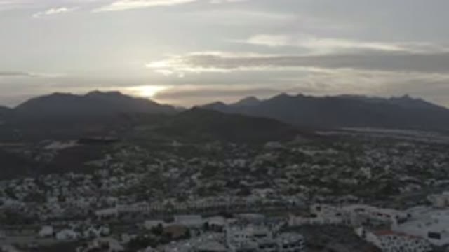 LOS CABOS MEXICO-2020: Sprawling Foothill Community At Sunrise On Cloudy Gray