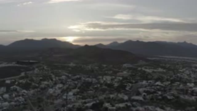 LOS CABOS MEXICO-2020: The Pleasant View Of The Sunset Behind The Mountain At