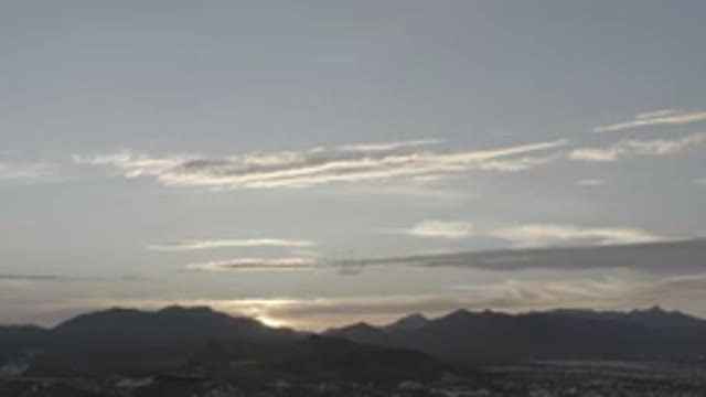 LOS CABOS MEXICO-2020: View Of The Cloud Streaked Sky Above Mountains At Sunset