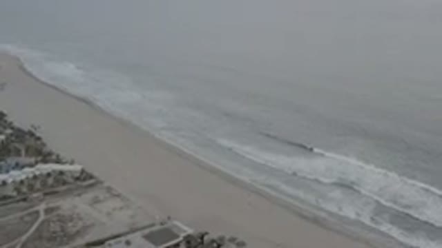 LOS CABOS MEXICO-2020: Quiet Deserted Beach On An Overcast Day Waves Crashing