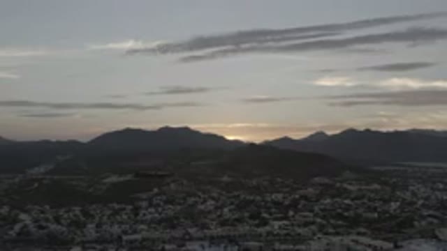 LOS CABOS MEXICO-2020: The Pleasant View Of The Mountain City Sunset Behind The