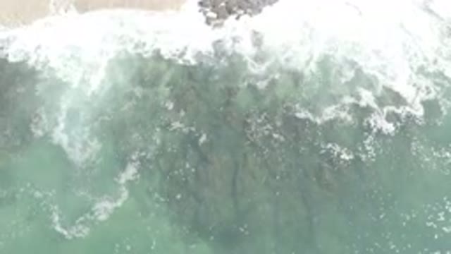 LOS CABOS MEXICO-2020: Beautiful Powerful White Sea Foam Waves Crashing Against Rocks