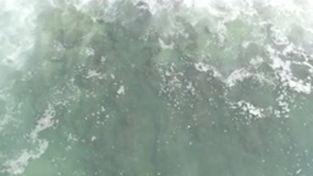 LOS CABOS MEXICO-2020: White Bubbles In Clean Water With Light Waves On It