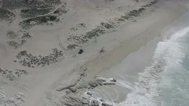 LOS CABOS MEXICO-2020: Aerial Footage Of A Sandy Beach As The Camera Pans Closer