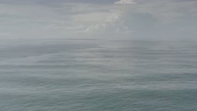 LOS CABOS MEXICO-2020: Aerial Footage Of A Large Body Of Water With Dense Cloud