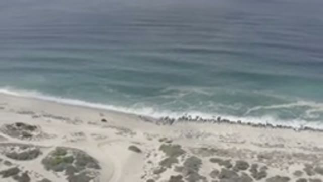 LOS CABOS MEXICO-2020: Birds Eye View Of The Incoming Tide The Crashing Waves