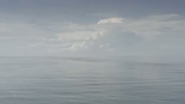 LOS CABOS MEXICO-2020: Moving Ocean Spanning Out To Horizon Showing Big White Clouds