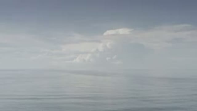 LOS CABOS MEXICO-2020: Large Cloud Formation Over Serene Calm Body Of Water